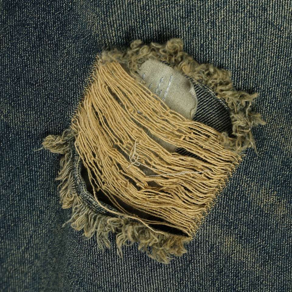 YESKICKS Fear Of God Washed Ripped Jeans For Unisex - Image 3